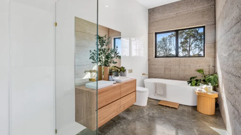 Buckley North Hemp House 5 A floating timber vanity features in the family bathroom